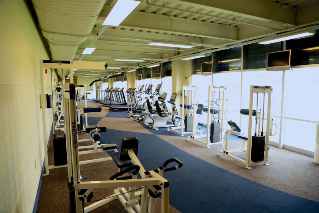 Weight and cardio machines in the fitness center