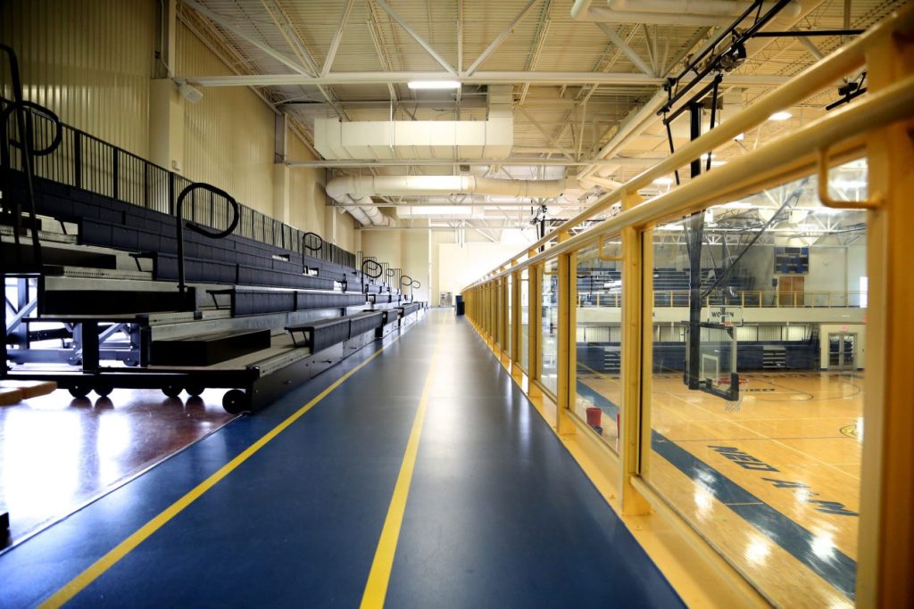 Indoor running track around gymnasium